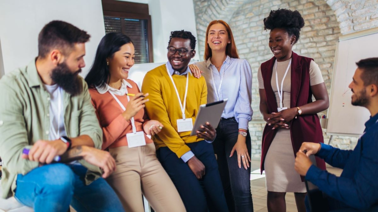 A group of happy employees chatting