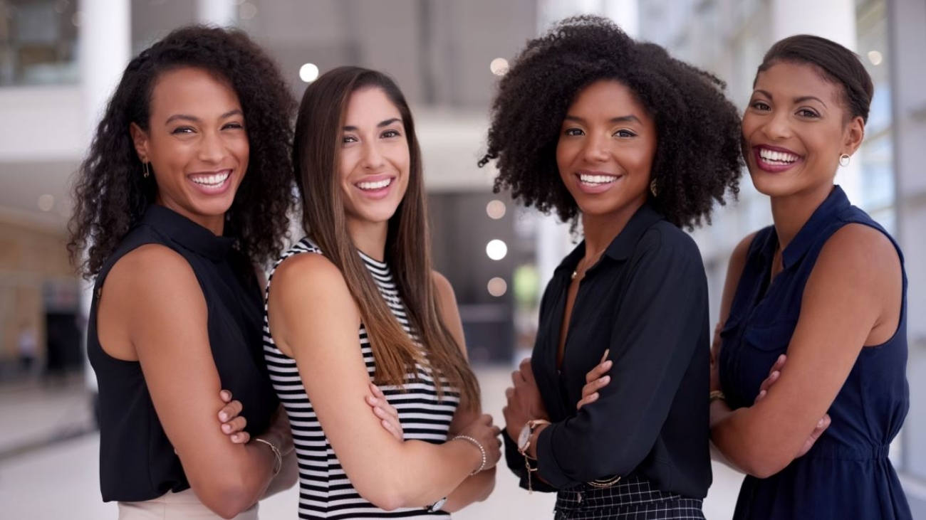 A diverse group of happy female employees