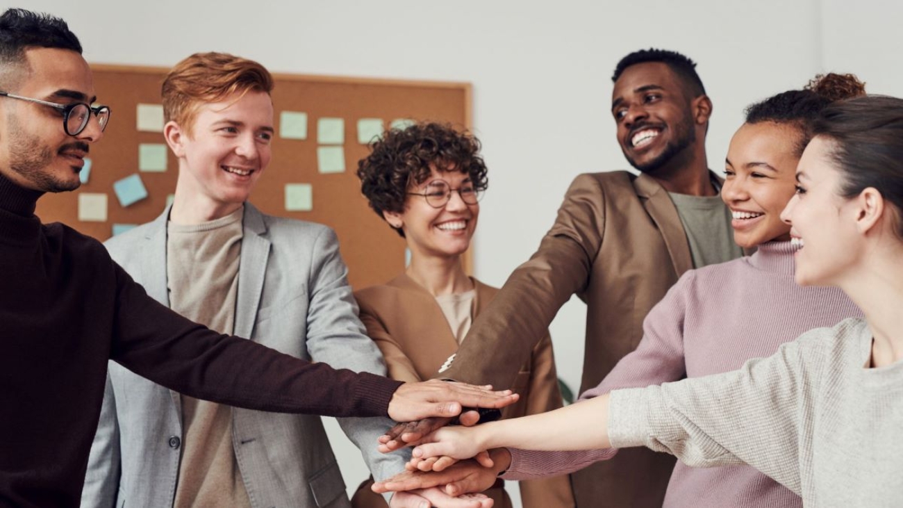 A picture of a group of employees in an office